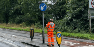 Lone Worker inspecting lighting columns